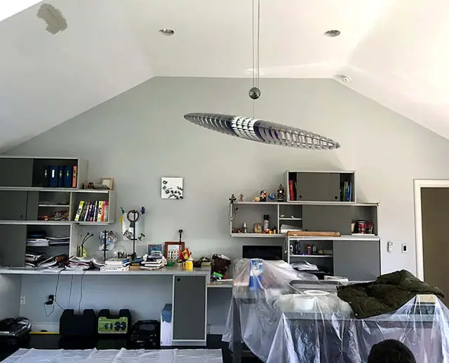 Walls and ceiling in one tone — Open room, furniture protected