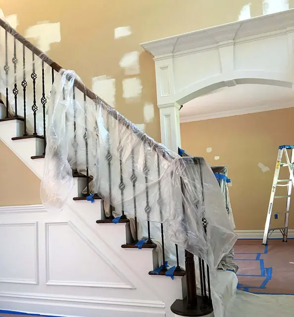 Wainscot, stairs, and a green room — Stair hall, railing masked