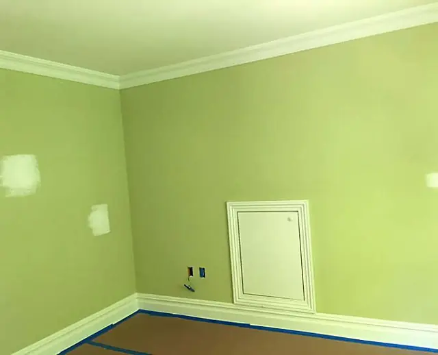 Wainscot, stairs, and a green room — Sage room with white trim