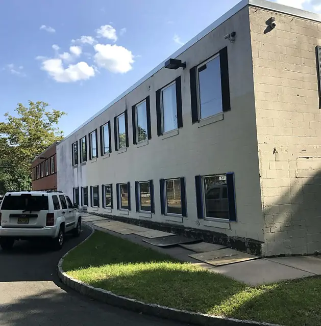 Block and brick, coated — Two-story elevation