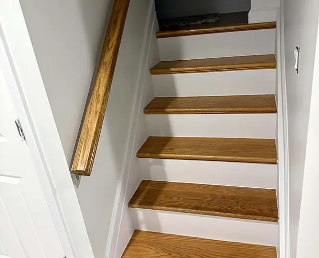 Walls, cabinets, and stair risers — White risers, oak treads